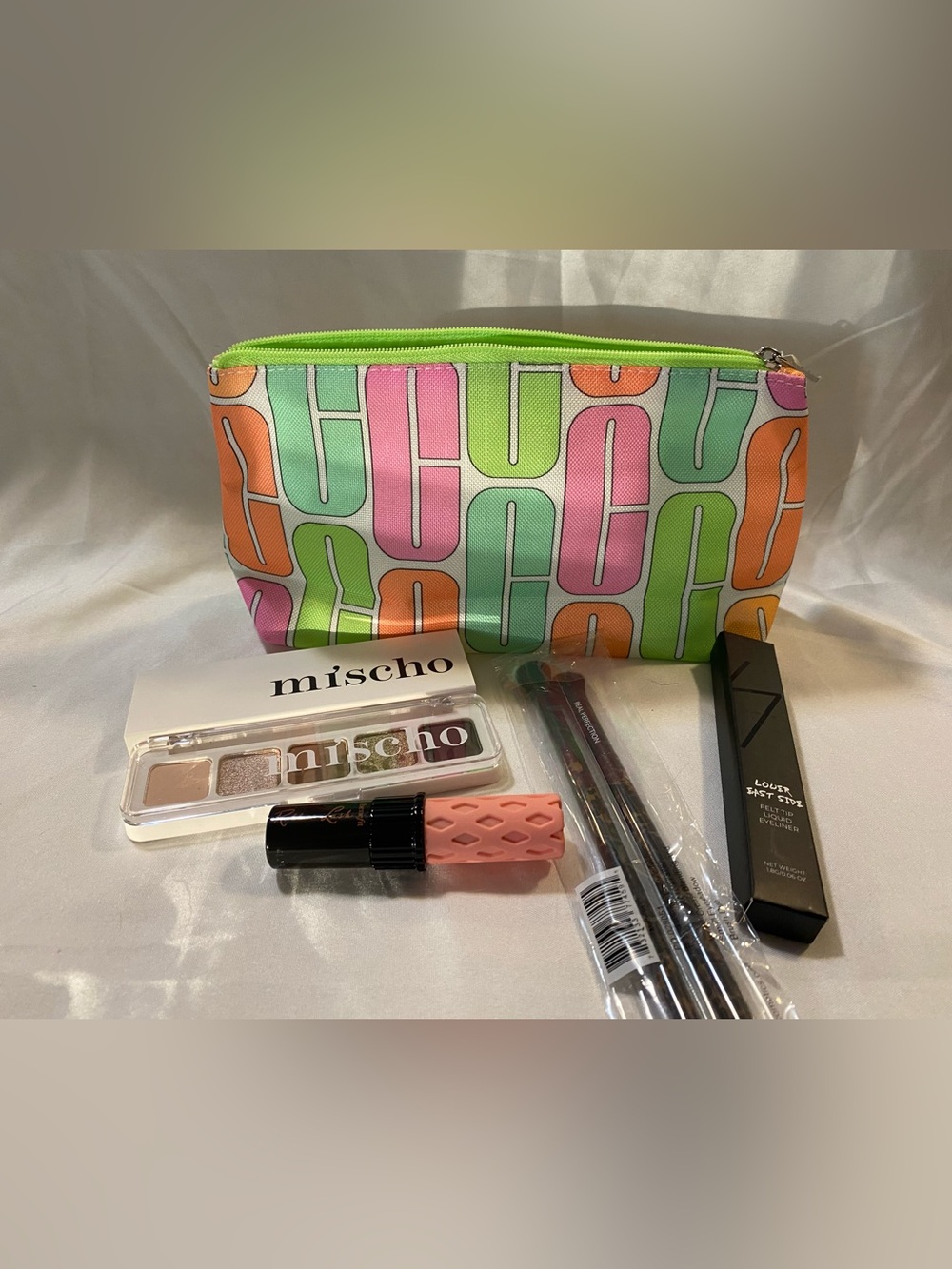 5 piece  set- Clinique make up bag, eye shadow,liquid liner, mascara, brushes